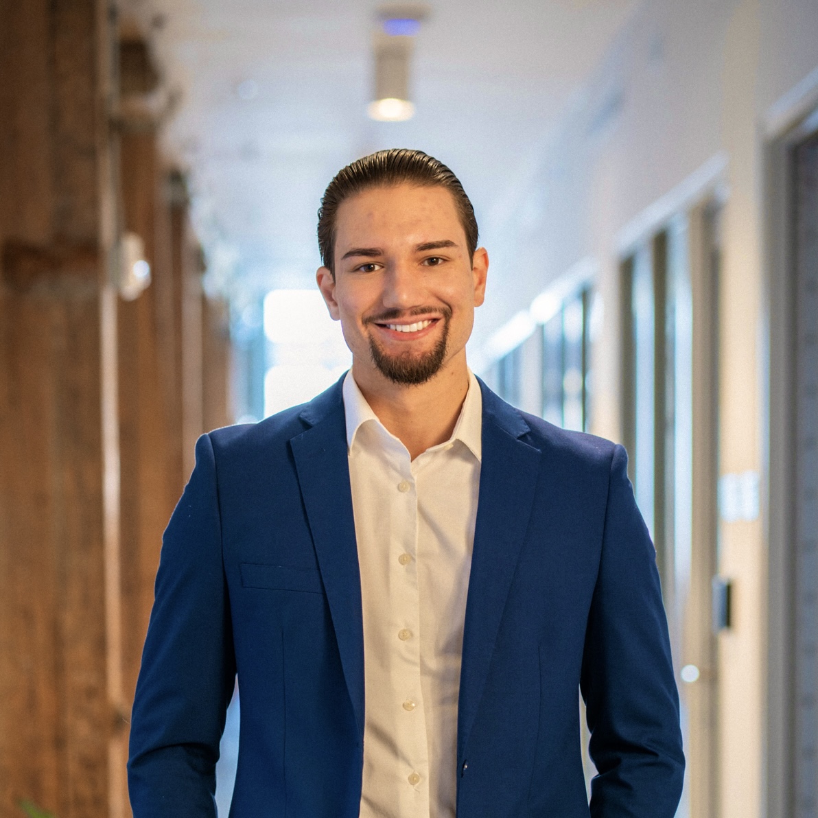 Gianni Rodriguez, Mortgage Protection Specialist, wearing a blue suit